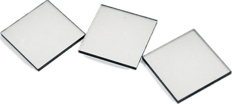 Three square single-crystal diamond seed plates on a white background.